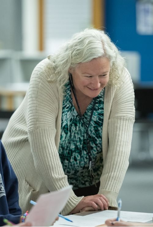 Calverton teacher helping students