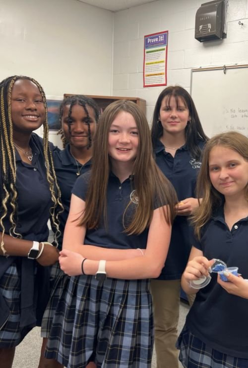 group of 5 female Calverton students wearing school uniforms